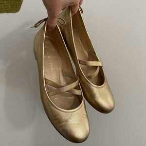 Stewart Weitzman Gold leather ballet flats with bow detail